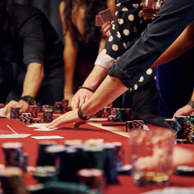 people-elegant-clothes-standing-playing-poker-casino-together